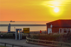Sonnenuntergang vom Balkon aus betrachtet